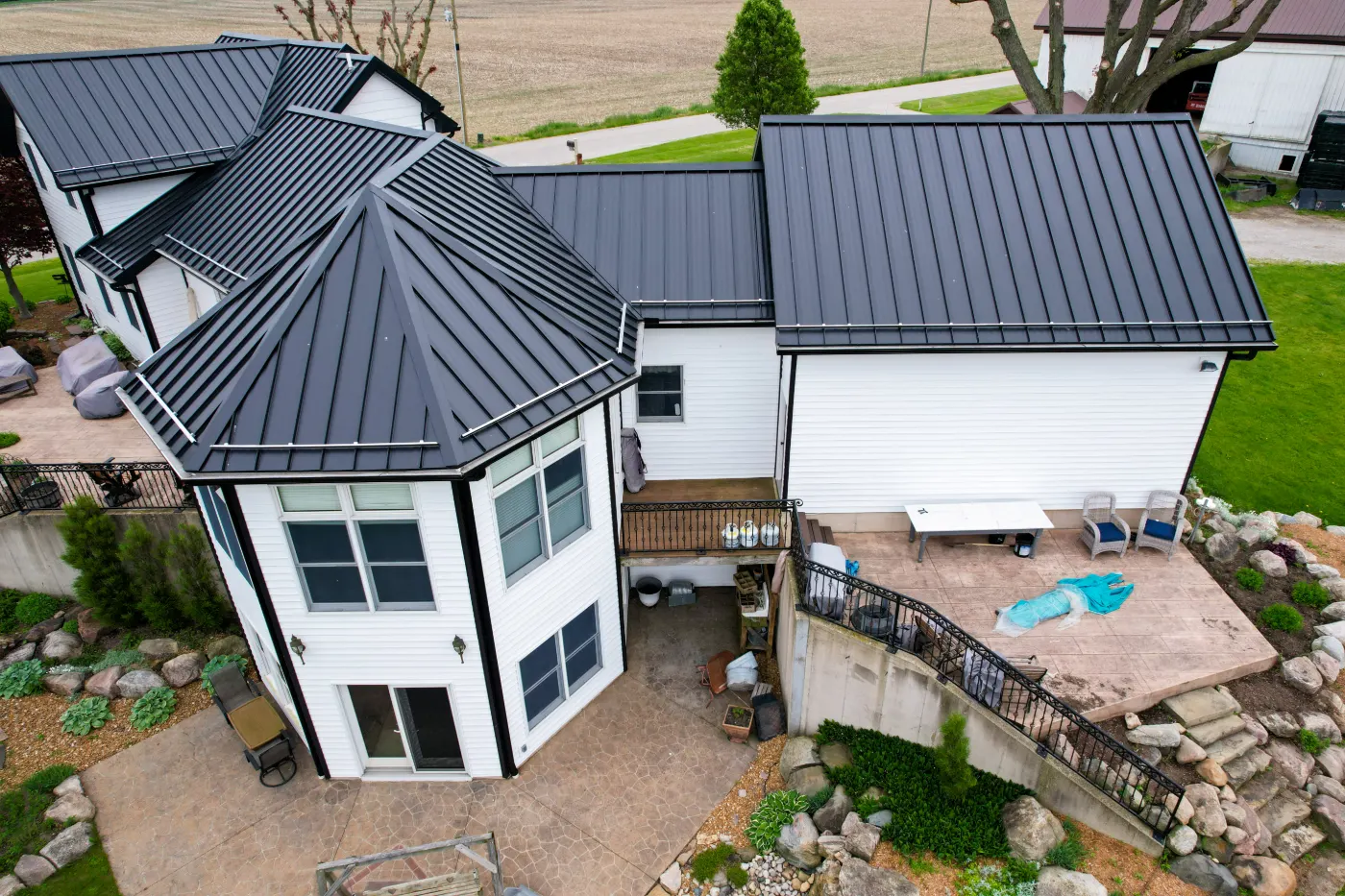 Siding installation documented in Anson